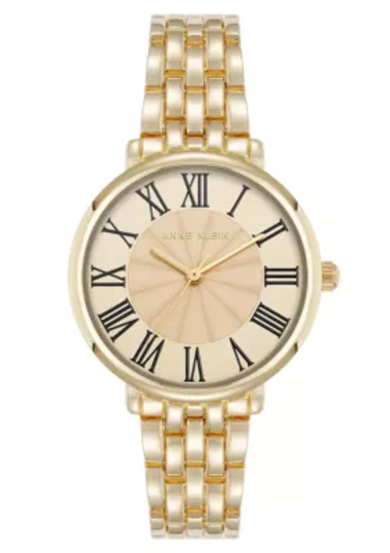 Anne Klein Women's Quartz Round Roman Numeral Gold-Tone Metal Alloy and Champagne Dial Watch, 32mm