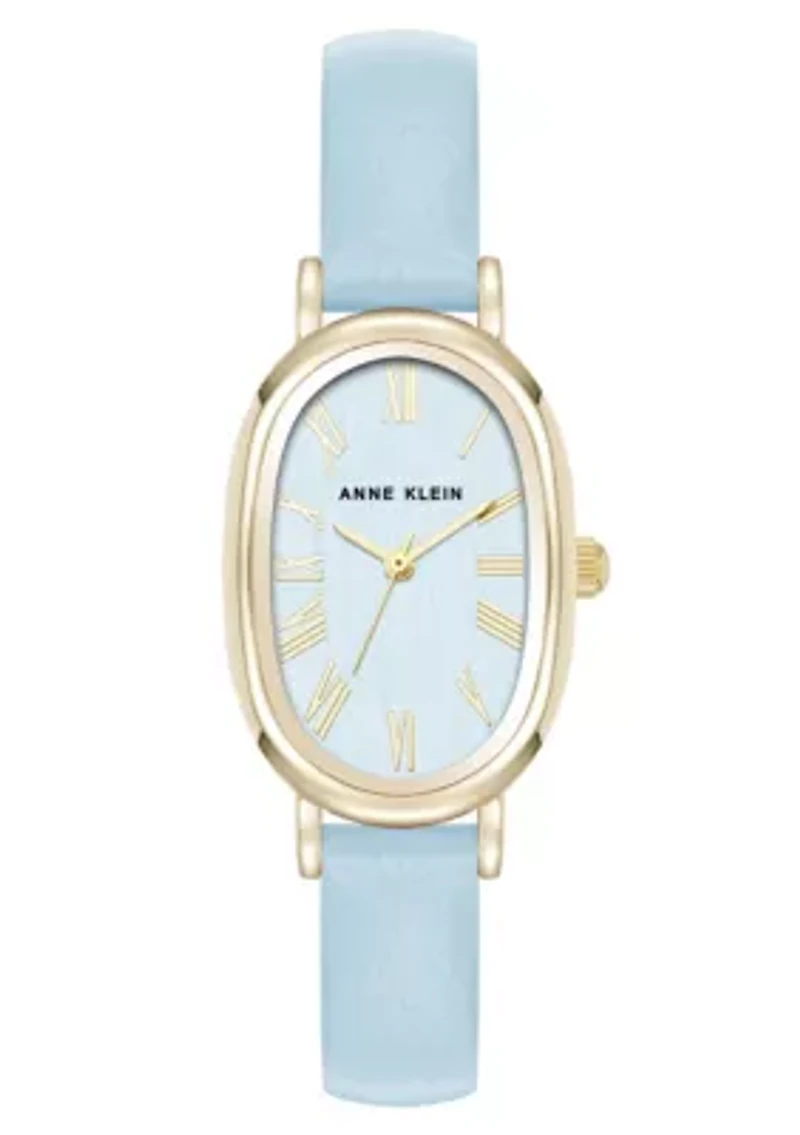 Anne Klein Women's Quartz Oval Light Blue PU Leather and Gold-Tone Metal Alloy Watch, 23mm