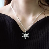 Snowflake CZ Pendant and Earring Set with Silver Plating