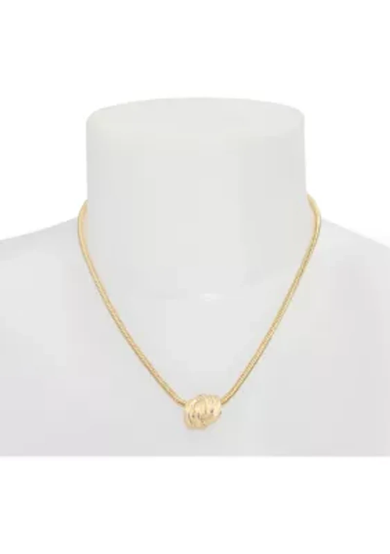 Gold Tone Knot Pendant Necklace