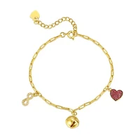 Lab Created 14k Yellow Gold Plated with Red & Cubic Zirconia Heart, Cowbell, and Infinity Dangle Charm Bracelet