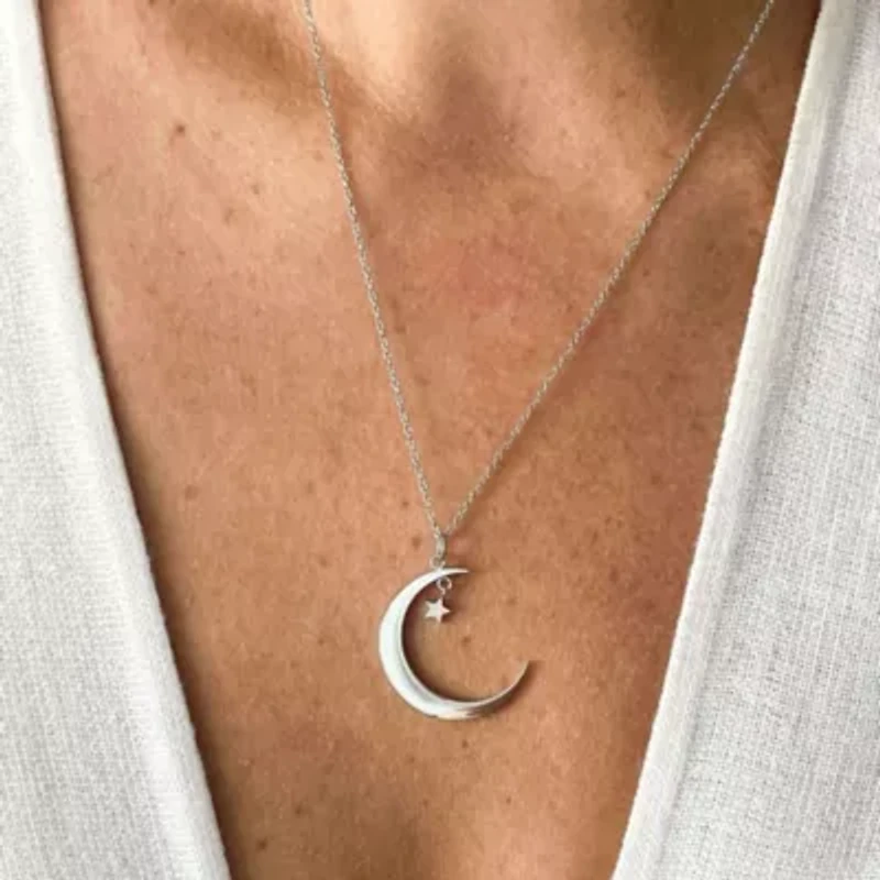 Rhodium Plated Hanging Moon and Star Necklace