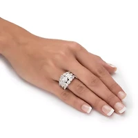 6.40 Cttw. Round and Baguette Sterling Silver Cubic Zirconia Engagement Ring