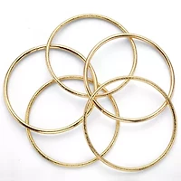 5 Piece Bangle Bracelet Set in Textured and Polished Yellow Goldtone