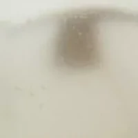 Floating White Bead Clip Earrings