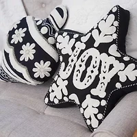 18" x 17" Onyx Snowflake Shaped Throw Pillow