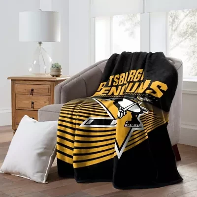 NHL Officially Licenced Pittsburgh Penguins 60" x 80" Raschel Throw Blanket