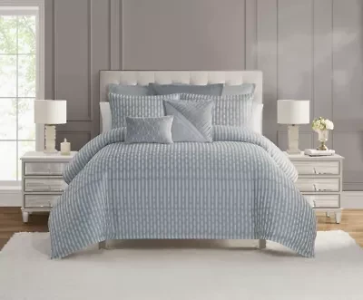 Elevate your home décor with the Waterford Aretha Decorative Pillow, an exquisite embodiment of comfort and sophistication. Designed in a versatile 12x18 size, this pillow features a stunning blue-dominant color palette, evoking a sense of serene luxury. The intricate pattern, meticulously crafted, adds a layer of refined texture, making it an eye-catching centerpiece on any sofa, bed, or accent chair. Its design harmonizes effortlessly with modern, classic, or transitional interiors, creating an inviting yet elegant ambiance. Beyond its visual appeal, the Aretha pillow promises unparalleled comfort. The soft, high-quality materials provide plush support, perfect for lounging or enhancing your relaxation space. Whether used as a decorative accent or a functional piece, this pillow delivers both style and substance.