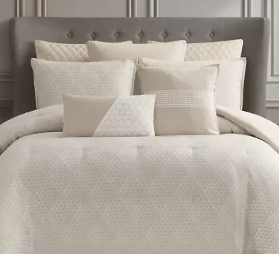 Add a refined touch of elegance to your bedding with the Waterford Houston Jade Euro Sham. This luxurious sham perfectly complements the Houston Jade Comforter Set, featuring a serene jade green tone that brings a fresh, calming feel to your bedroom. The meticulous pattern enhances the sham's sophisticated appeal, creating a harmonious and upscale look. Ideal for layering with the comforter, this euro sham adds depth and texture to your bed while offering extra comfort with its plush fill. The Houston Jade Euro Sham is an essential accent, adding both style and tranquility to your space with its modern, luxurious design.