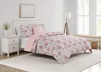 Bring serene charm to your bedroom with the Margot Mauve 5pc Comforter and Quilt Set. Delicate floral blooms in soft mauves and lavender hues are printed on silky microfiber, reversing to a soothing blush tone. Romantic, airy