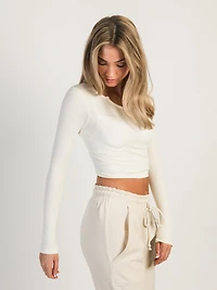HARLOW HARPER SEAMLESS NOTCH LONG SLEEVE - CREAM CLEARANCE