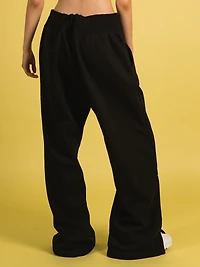 NIKE SPORTSWEAR PHOENIX PANTALON LARGE TAILLE HAUTE - LIQUIDATION