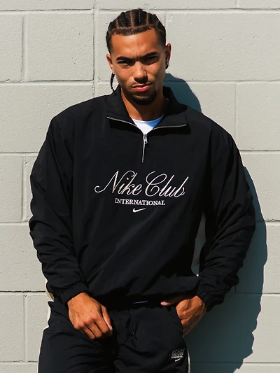 NIKE INTERNATIONAL HALF ZIP