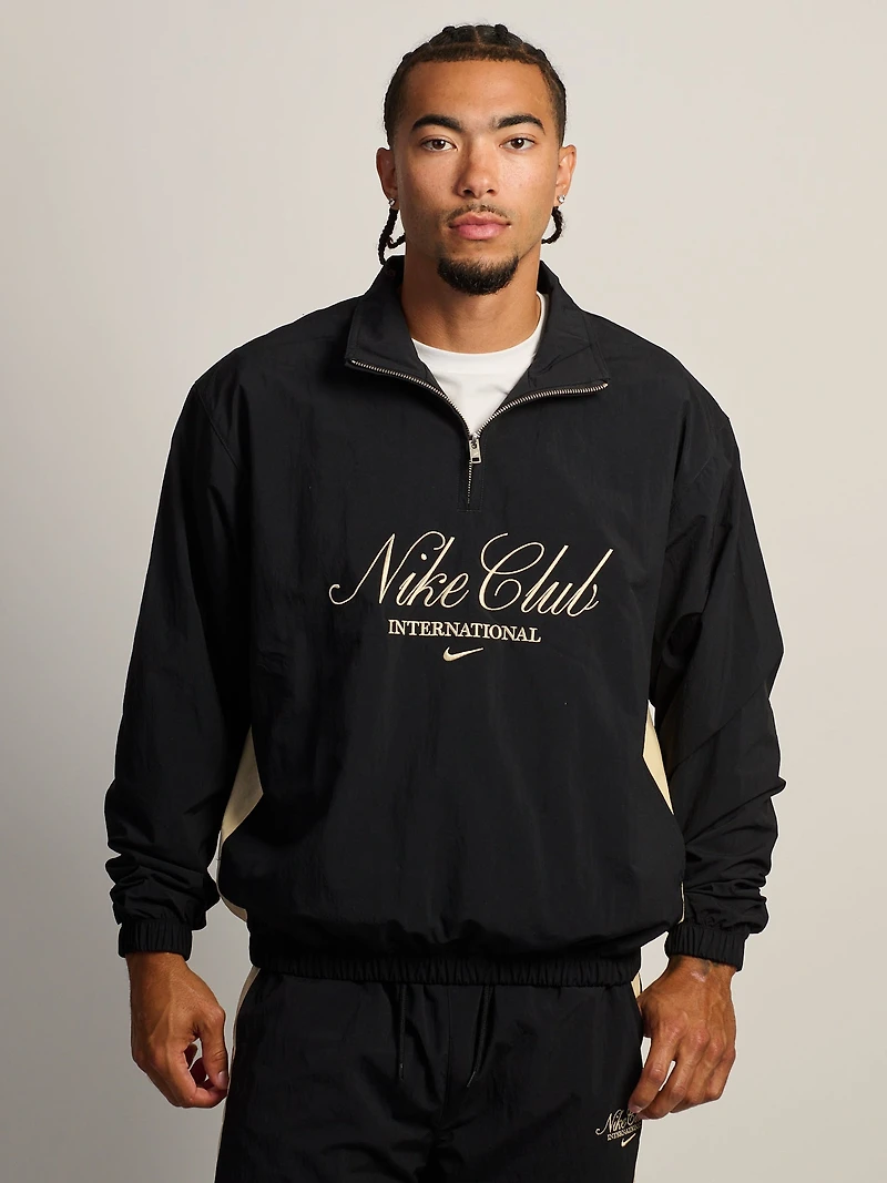 NIKE INTERNATIONAL HALF ZIP