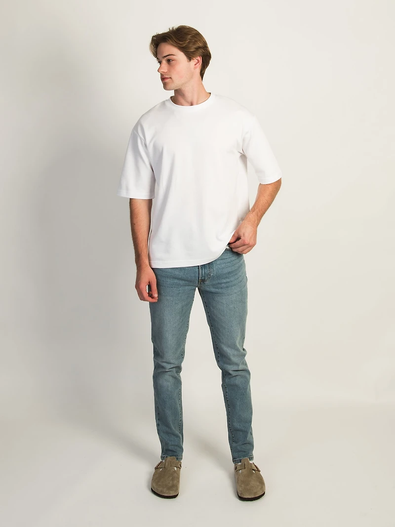 JEAN ATHLÉTIQUE TAINTED