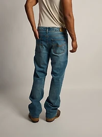 TAINTED BOOT CUT JEAN - MIDWASH