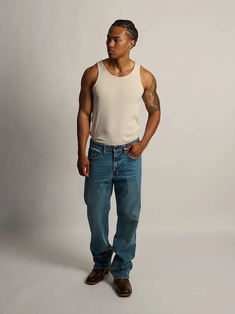 TAINTED BOOT CUT JEAN - MIDWASH