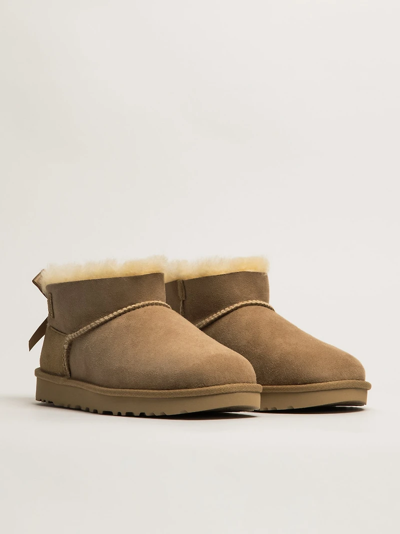 UGG ULTRA MINI BAILEY BOW BOOT - SAND