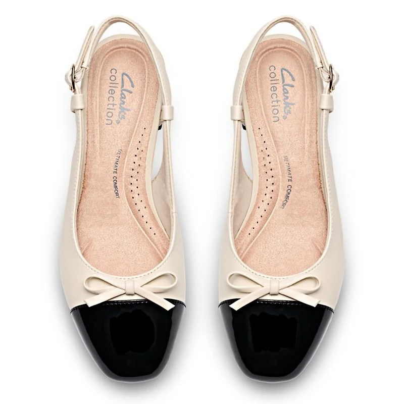 Iridessa Sling – Élégance moderne, confort assuré