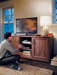 Ainsworth Walnut 64" Storage Media Console with Glass/Wood Doors