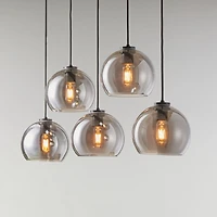 Arren Black 5-Light Linear Pendant with Round Silver Glass Shades 42"