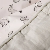 Hoppy Tails Pom Pom Baby Crib Quilt