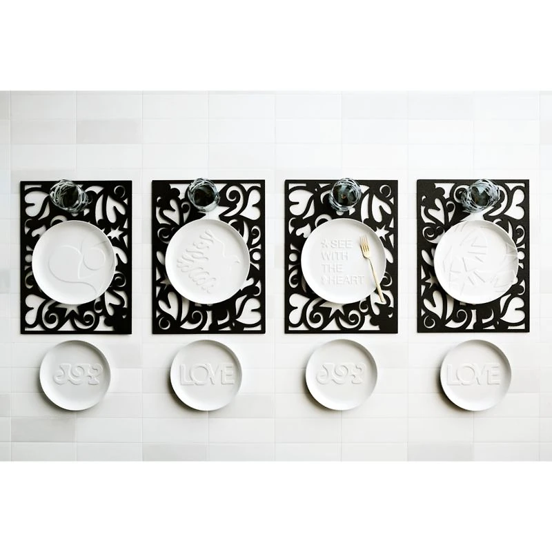 Heart Dance Reversible Black Laser-Cut Cork Placemat by Lucia Eames