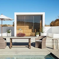 Abaco Resin Wicker Outdoor Dining Chair with Graphite Sunbrella ® Cushion