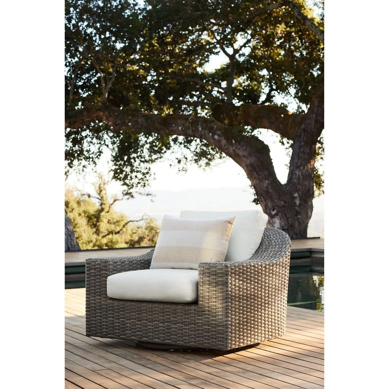 Abaco Resin Wicker Outdoor Swivel Lounge Chair with Natural Sunbrella ® Cushions