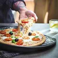 Emily Henry Black Pizza Stone