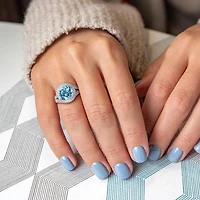 Julianna B Sterling Silver Sky Blue Topaz and White Crossover Ring