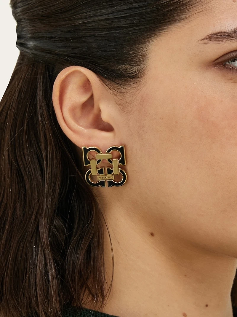 Four Gancini clip on earrings