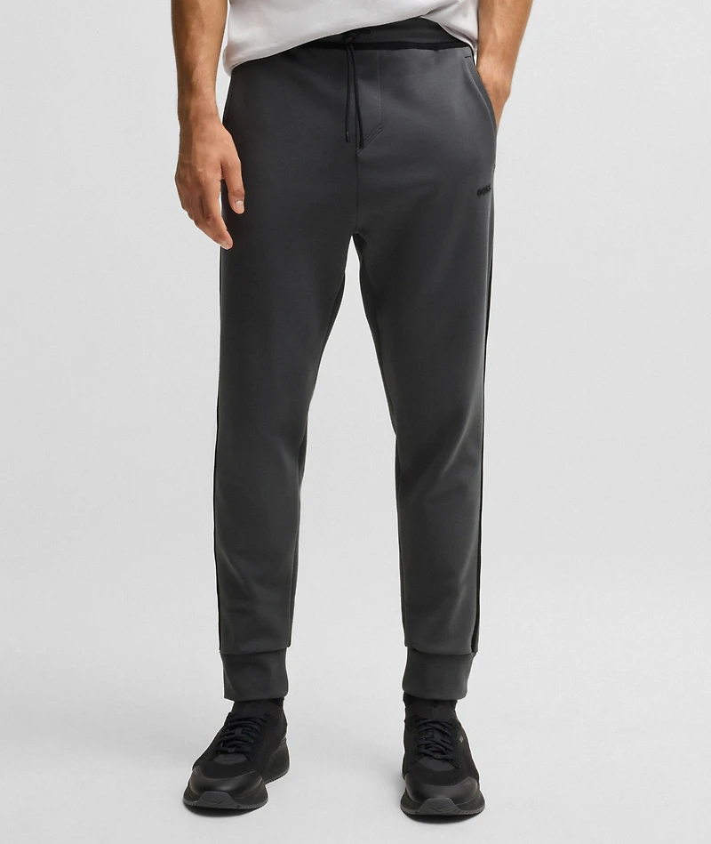 Hadiko Tape Logo Track Pants