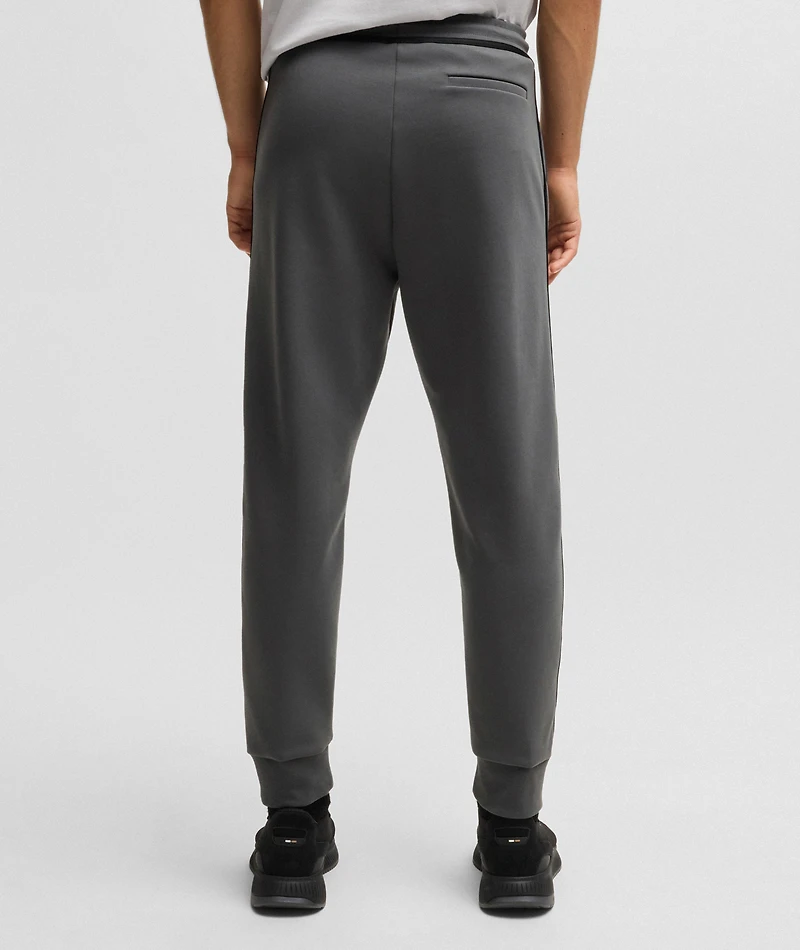 Hadiko Tape Logo Track Pants