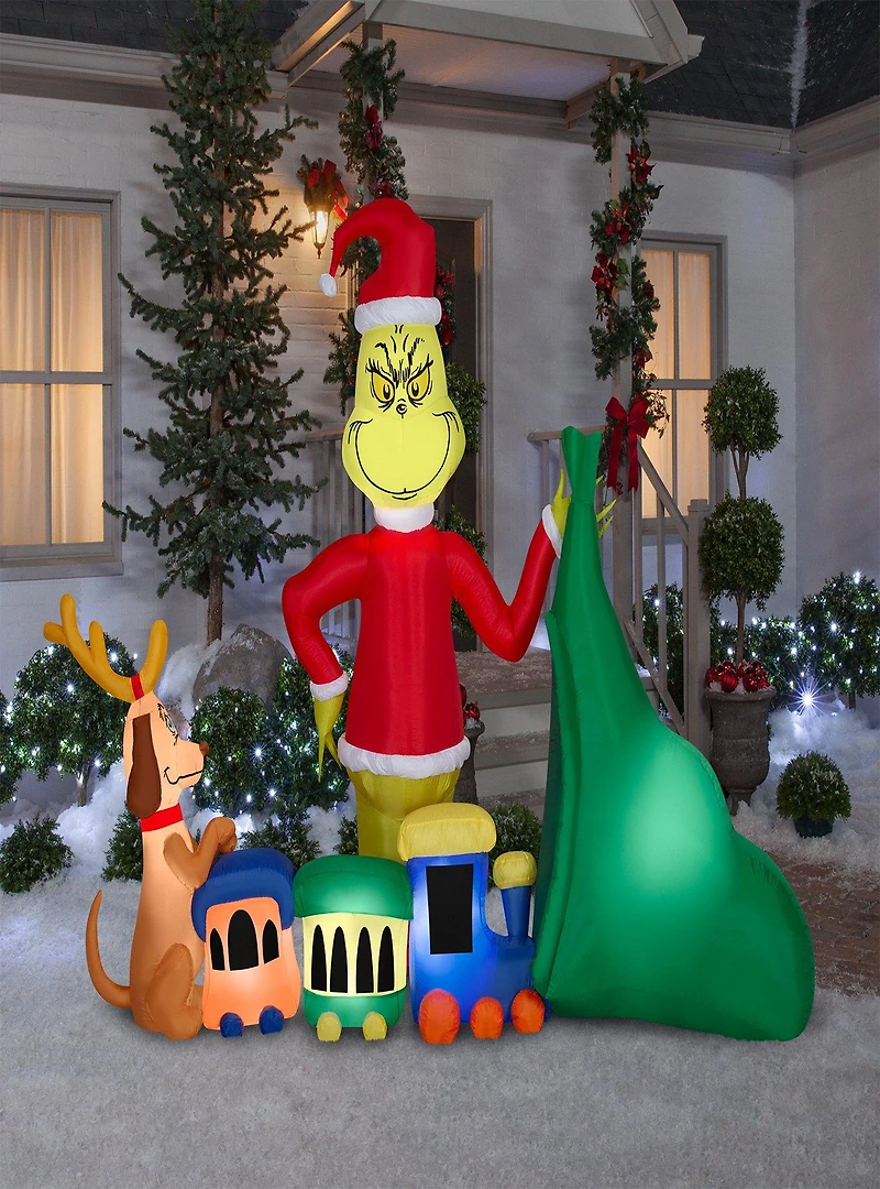 The Grinch Putting Train in Santa Sack Airblown
