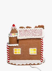 Gingerbread House With Santa Figure