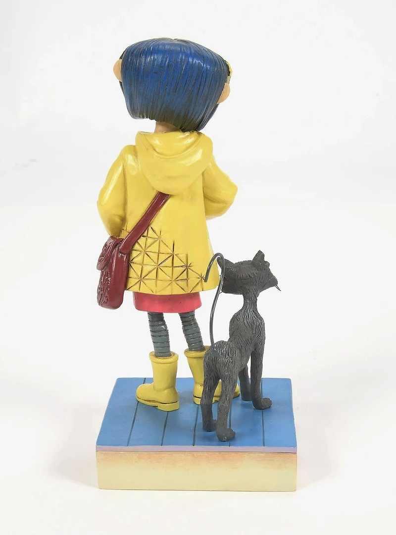 Enesco Coraline Heartwood Creek Coraline in Yellow Raincoat (Jim Shore) Figure
