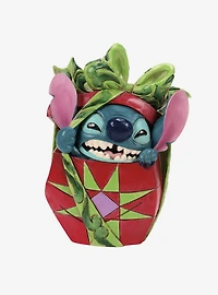 Enesco Disney Lilo & Stitch Traditions Holiday Mischief Stitch Tearing Present Figure