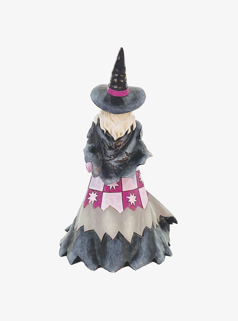 Halloween Witch Holding Pumpkin Figurine