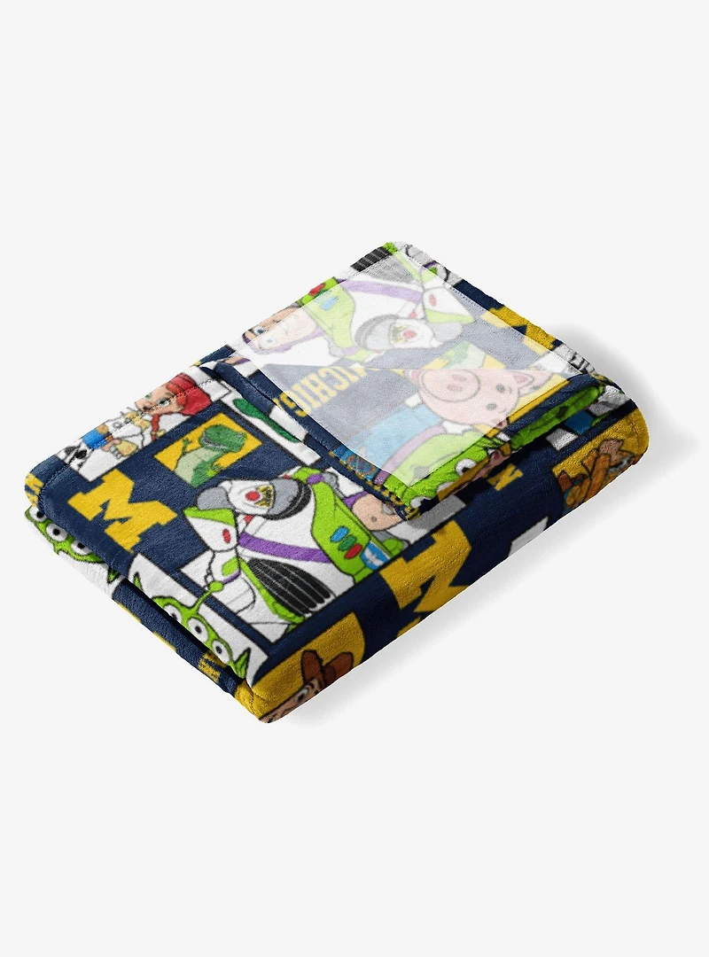 NCAA Michigan Wolverines Disney Toy Story Buzz Lightyear Cameo Hugger Pillow & Silk Touch Throw Blanket Set