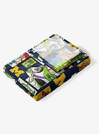 NCAA Michigan Wolverines Disney Toy Story Buzz Lightyear Cameo Hugger Pillow & Silk Touch Throw Blanket Set