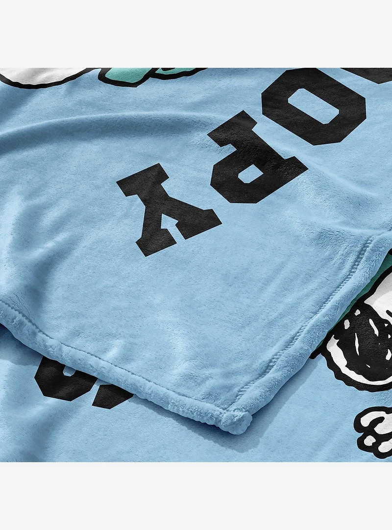 Peanuts Snoopy Skating Silk Touch Throw Blanket