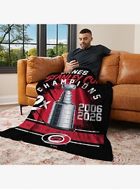 NHL Carolina Hurricanes Stanley Cup Multi-Champ Trophy Case Silk Touch Throw Blanket