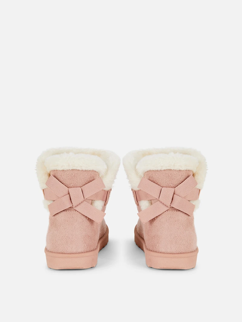 Snug Back Bow Boots