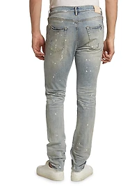 P001 Paint Splatter Distressed Skinny Jeans