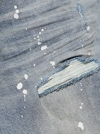 P001 Paint Splatter Distressed Skinny Jeans