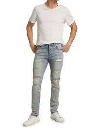 P001 Paint Splatter Distressed Skinny Jeans