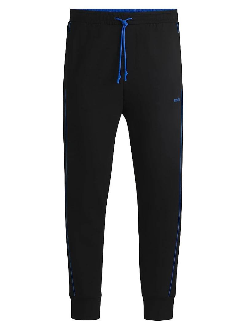 Stretch-Cotton Tracksuit Bottoms with Embossed Artwork