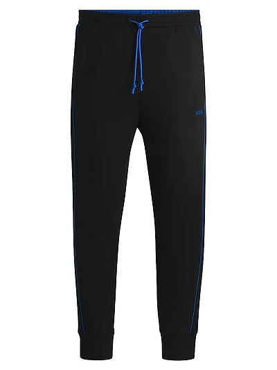 Stretch-Cotton Tracksuit Bottoms with Embossed Artwork