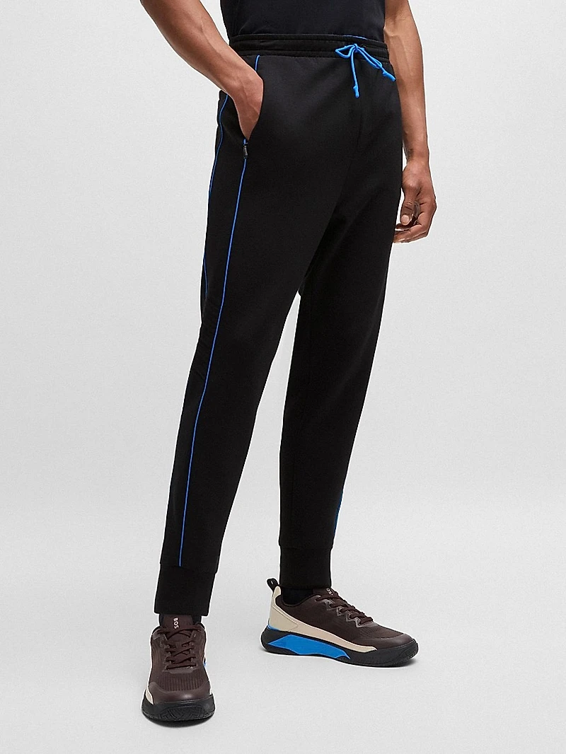 Stretch-Cotton Tracksuit Bottoms with Embossed Artwork